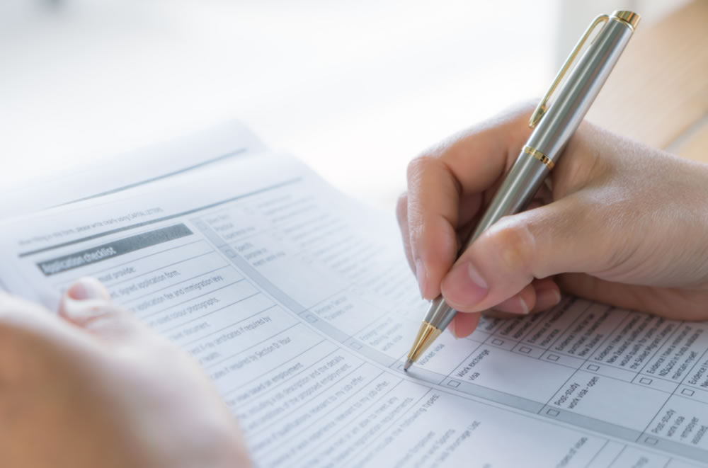 man filling up the form